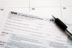 Us individual income tax return form, a Business Photo by 1miromiro