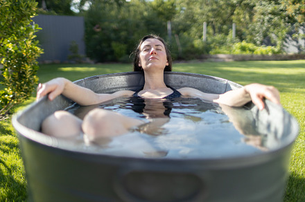 Woman relaxing in a bath tube