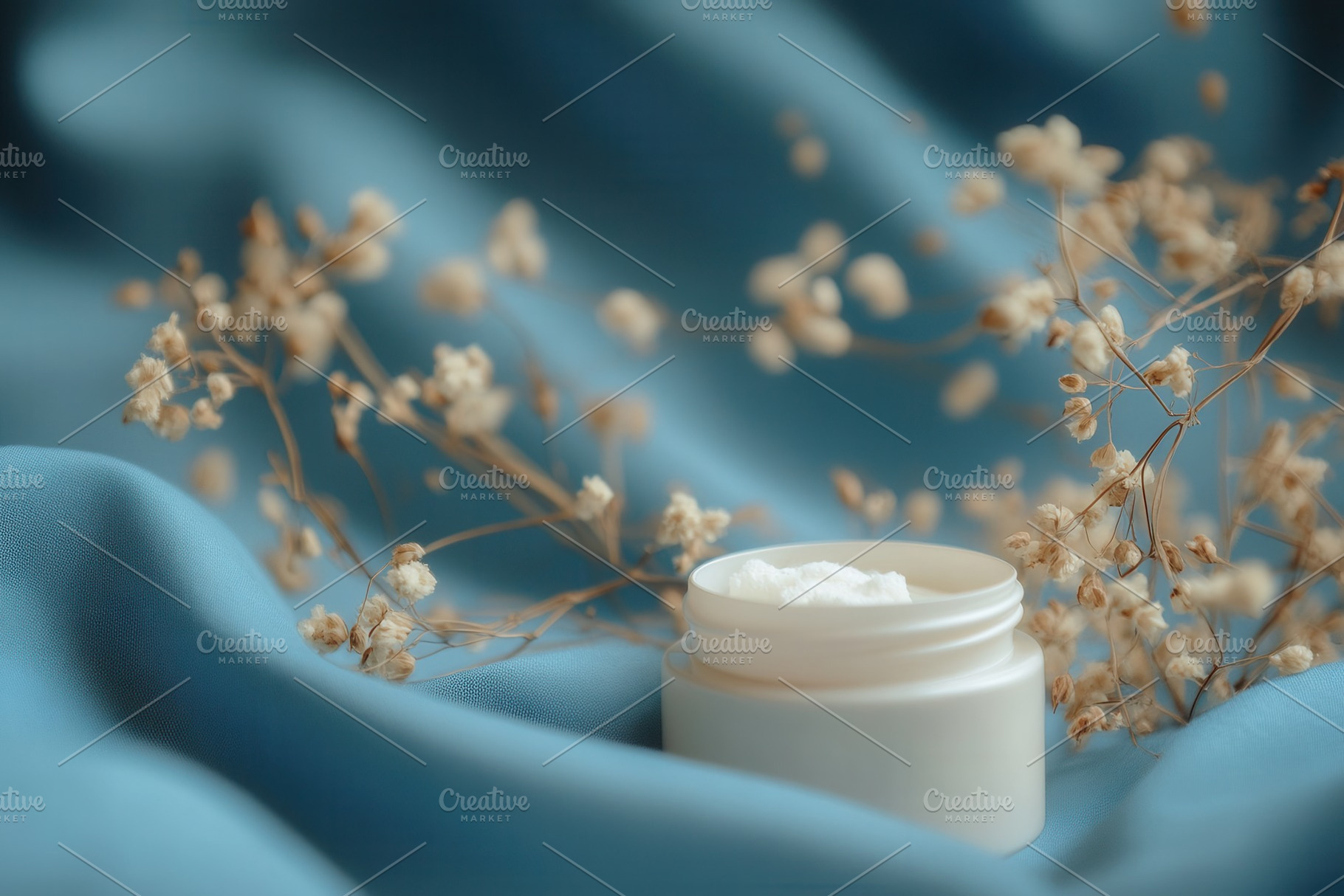 Delicate cream jar with blue fabric, a Photo by Pavel_design