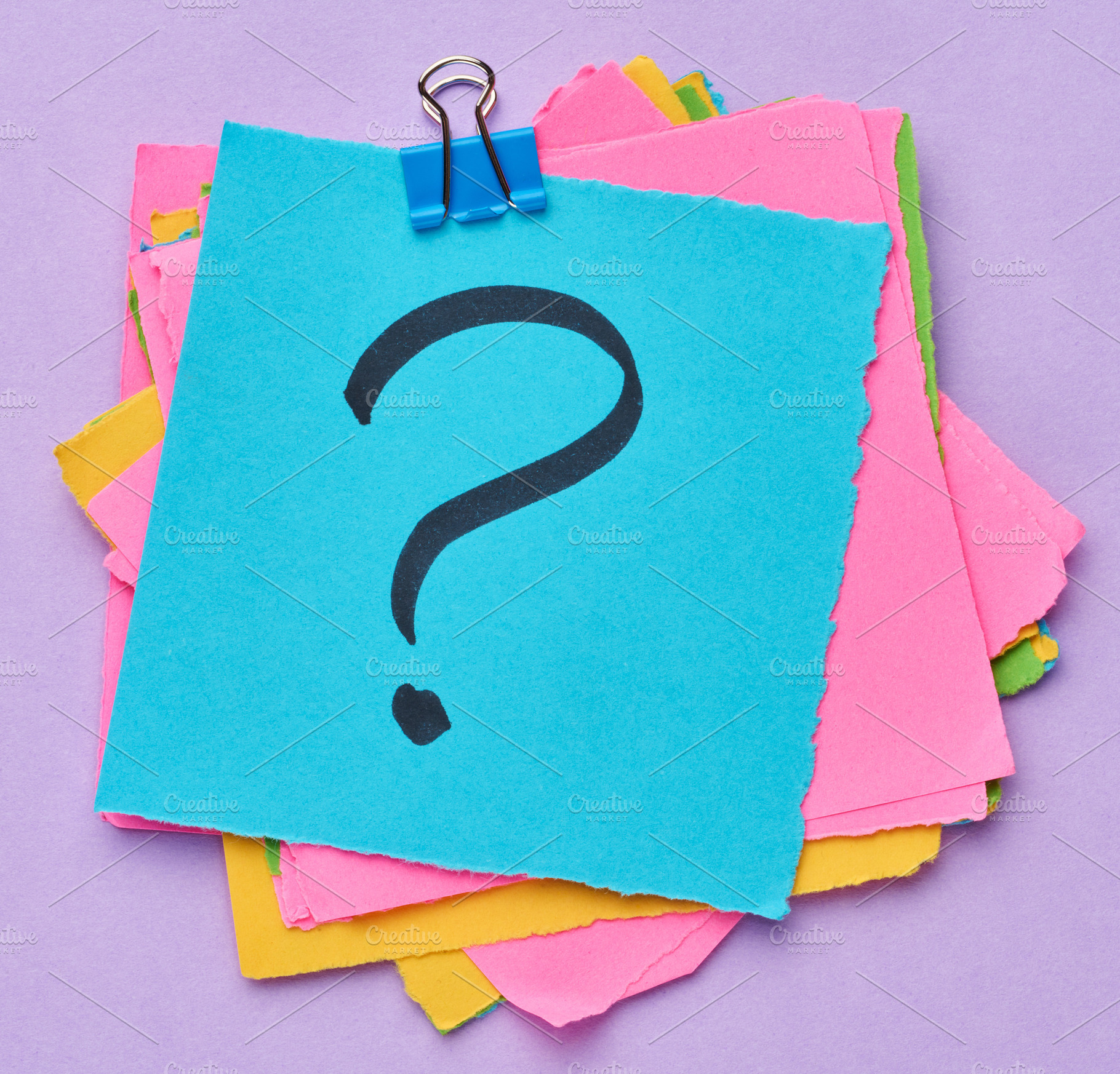 A stack of multi-colored square sticky notes with a question mar, a Business Photo by ndanko