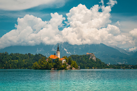 Famous buildings and beautiful lake, a Nature Photo by Alpine Dreams