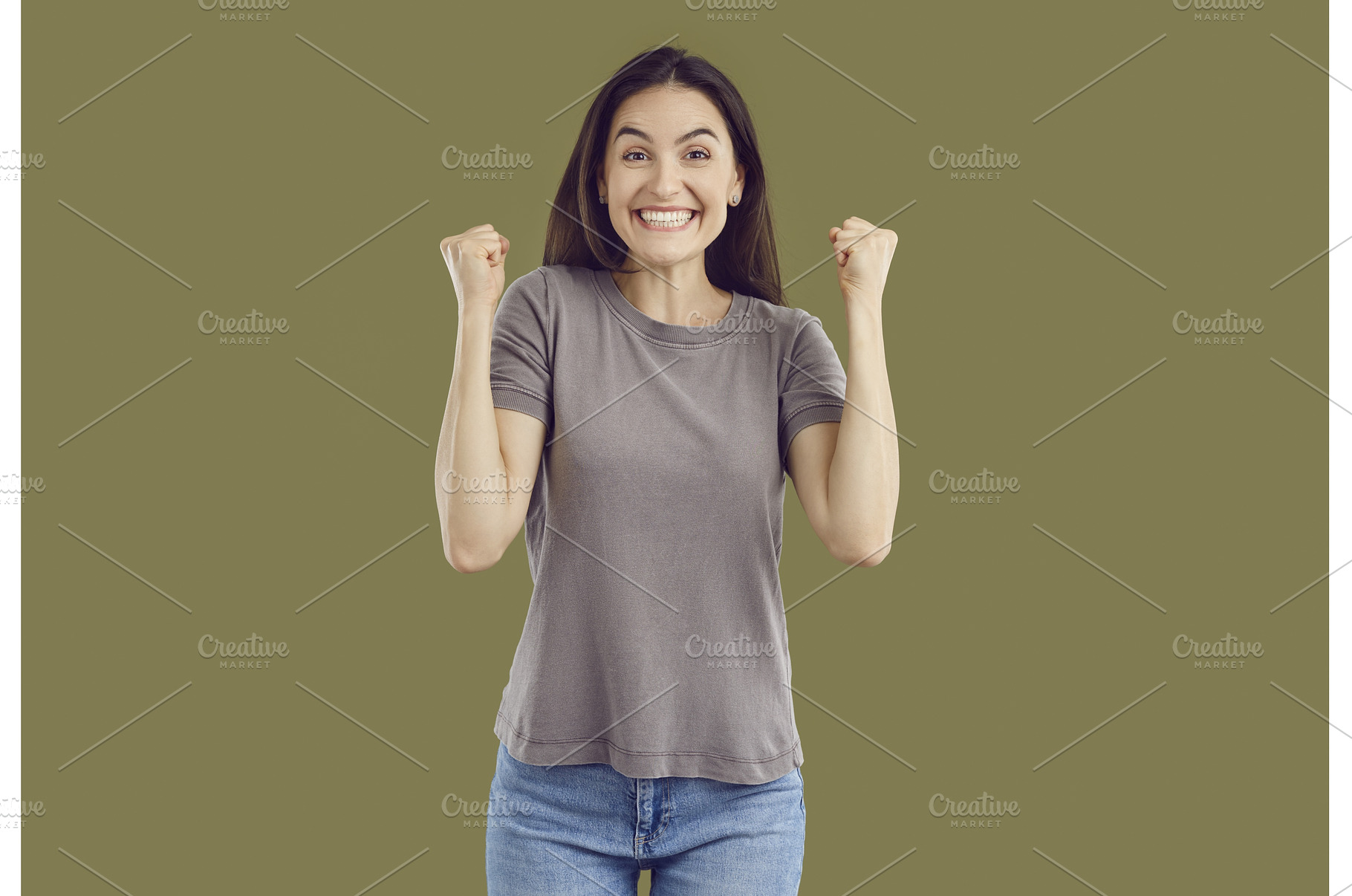 Portrait of happy girl making winner, a Person Photo by StudioRomantic