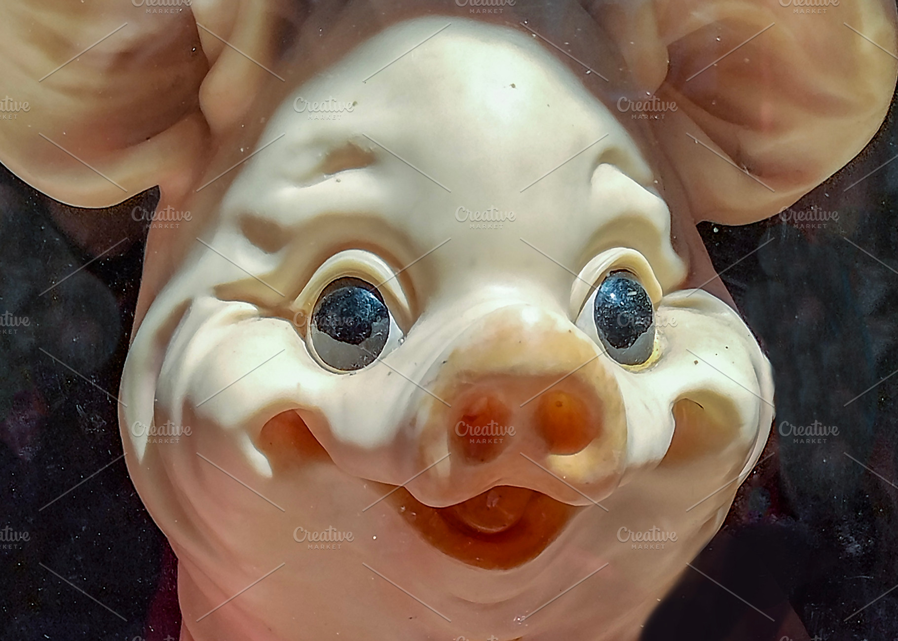 Whimsical pig toy close-up shot, an Animal Photo by DanFLCreativo