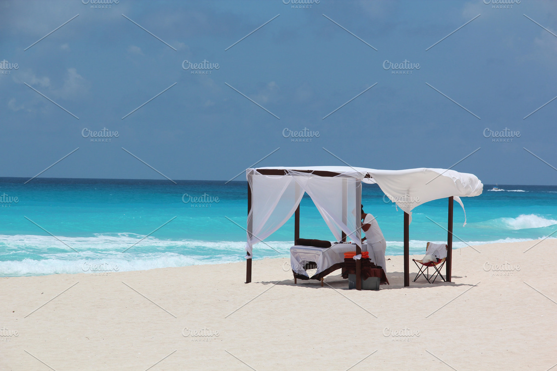 Massage booth Cancun Mexico, a Health & Medical Photo by RobertvanHaaren