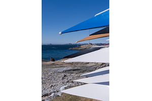 Prows of fast canoes and kayaks in, a Transportation Photo by Backyard Stock