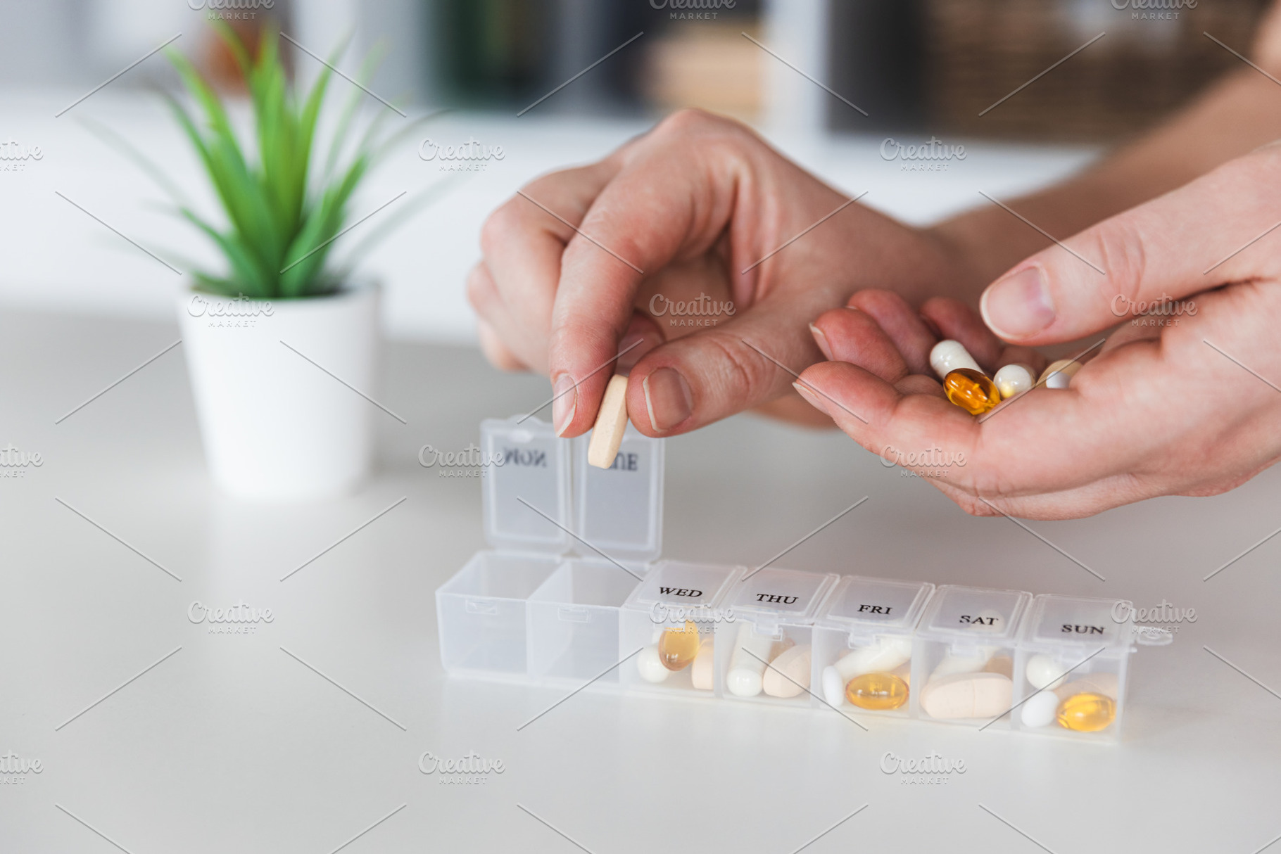 Medical pill box with tablet doses for daily take medicine with drugs, capsules, a Health & Medical Photo by Lenor4ik