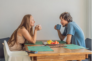 Woman and man having breakfast, a Person Photo by Elizaveta Galitskaya
