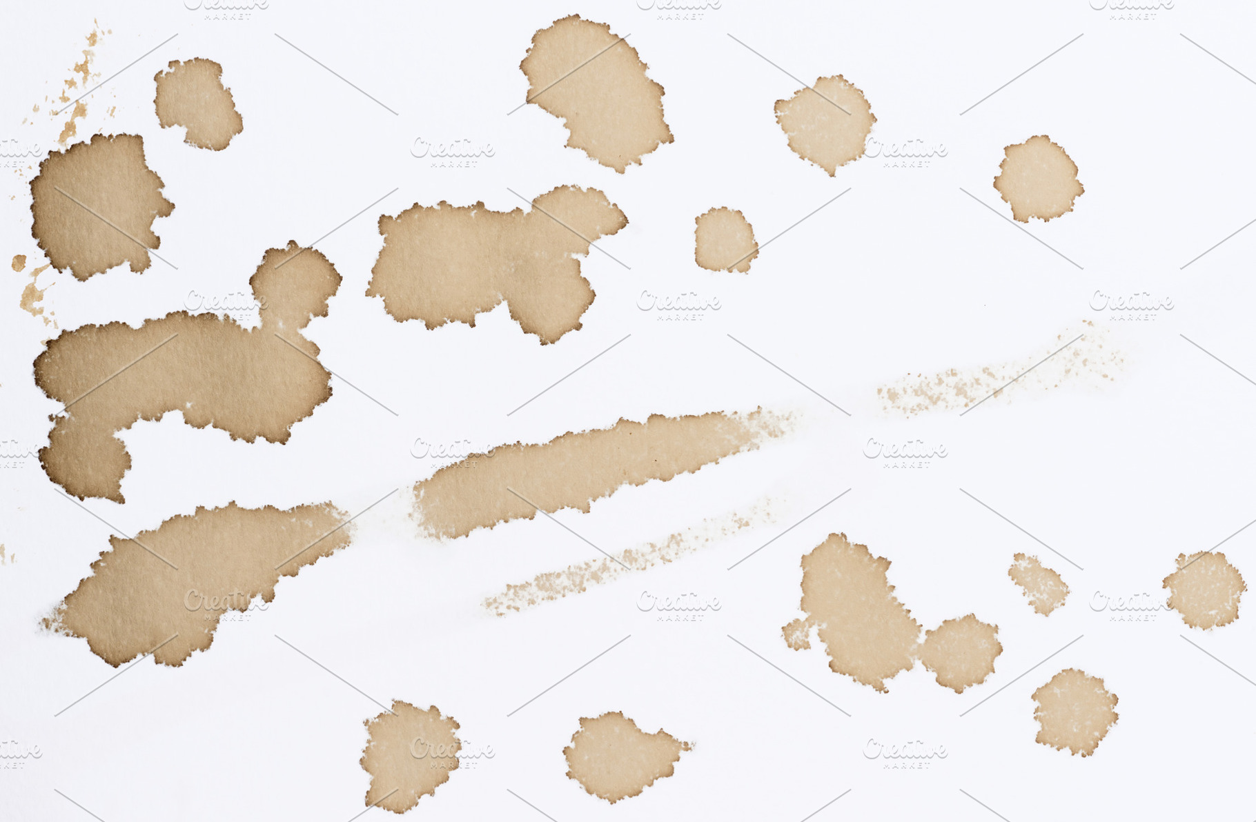 Various prints, blots and stains from spilled black coffee on wh, a Background Photo by ndanko
