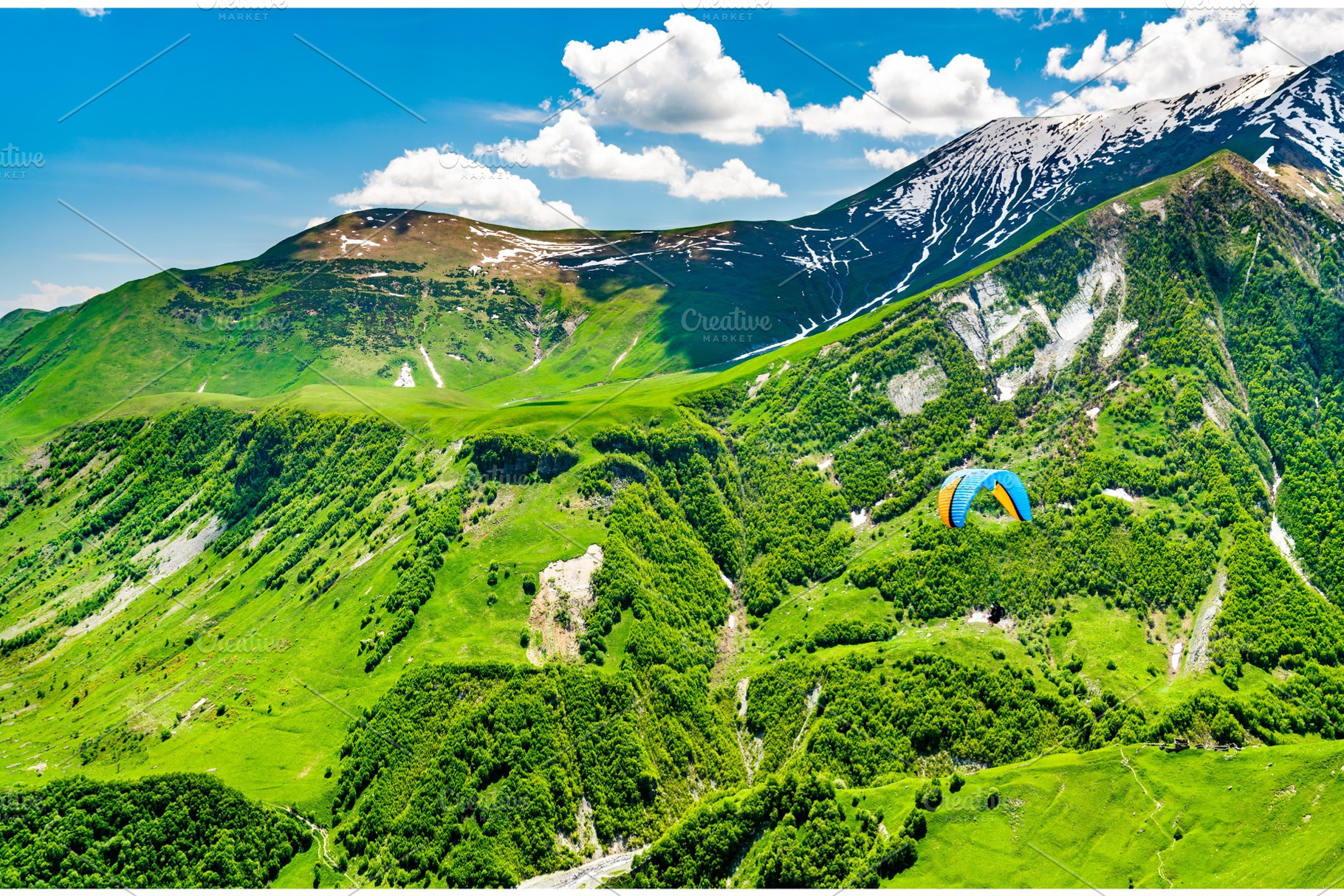 Paragliding over the Caucasus, a Nature Photo by Leonid Andronov