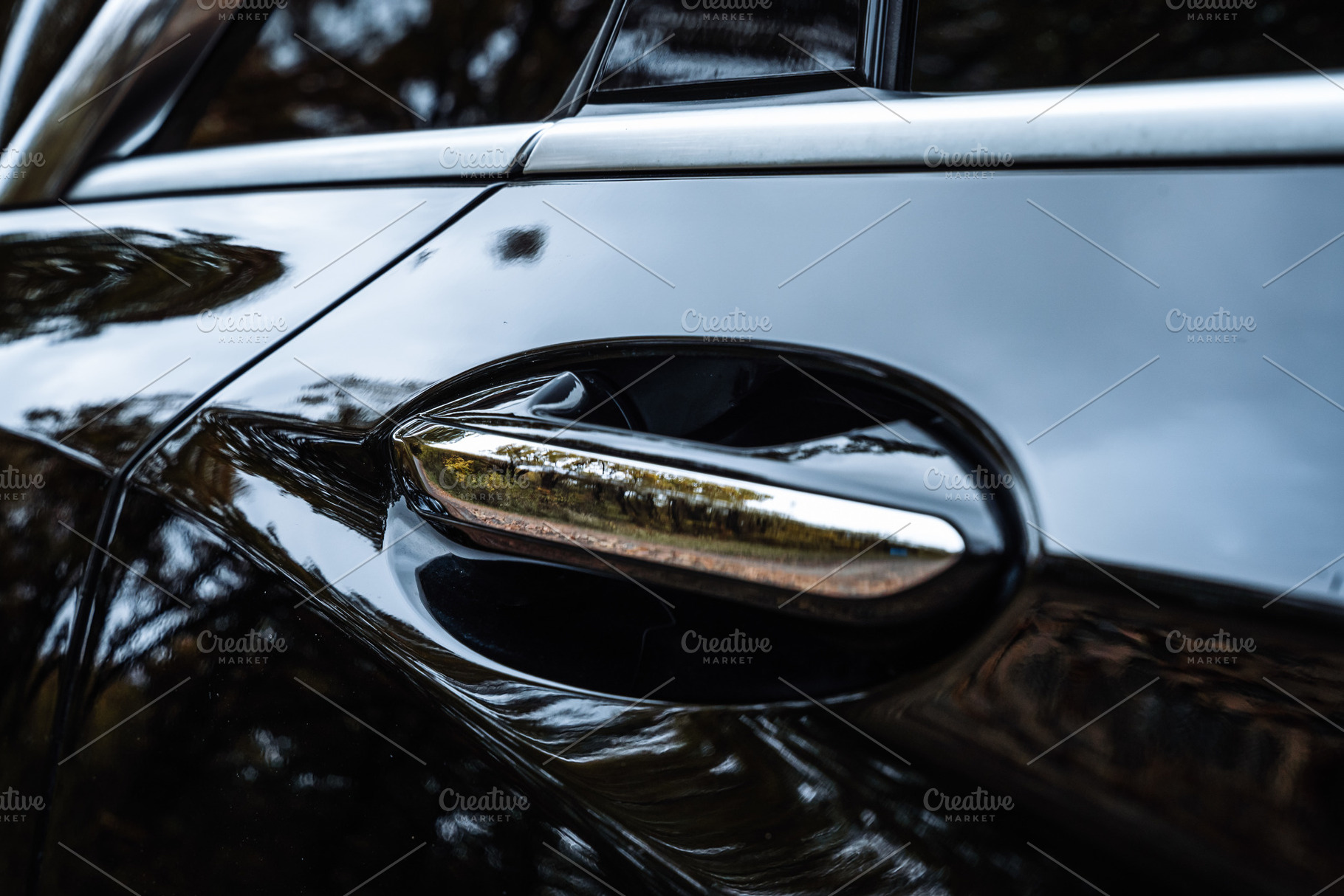 Car Door Handle Close Up with Glossy Reflection, a Transportation Photo by Red Hot Chili Pepper Shop