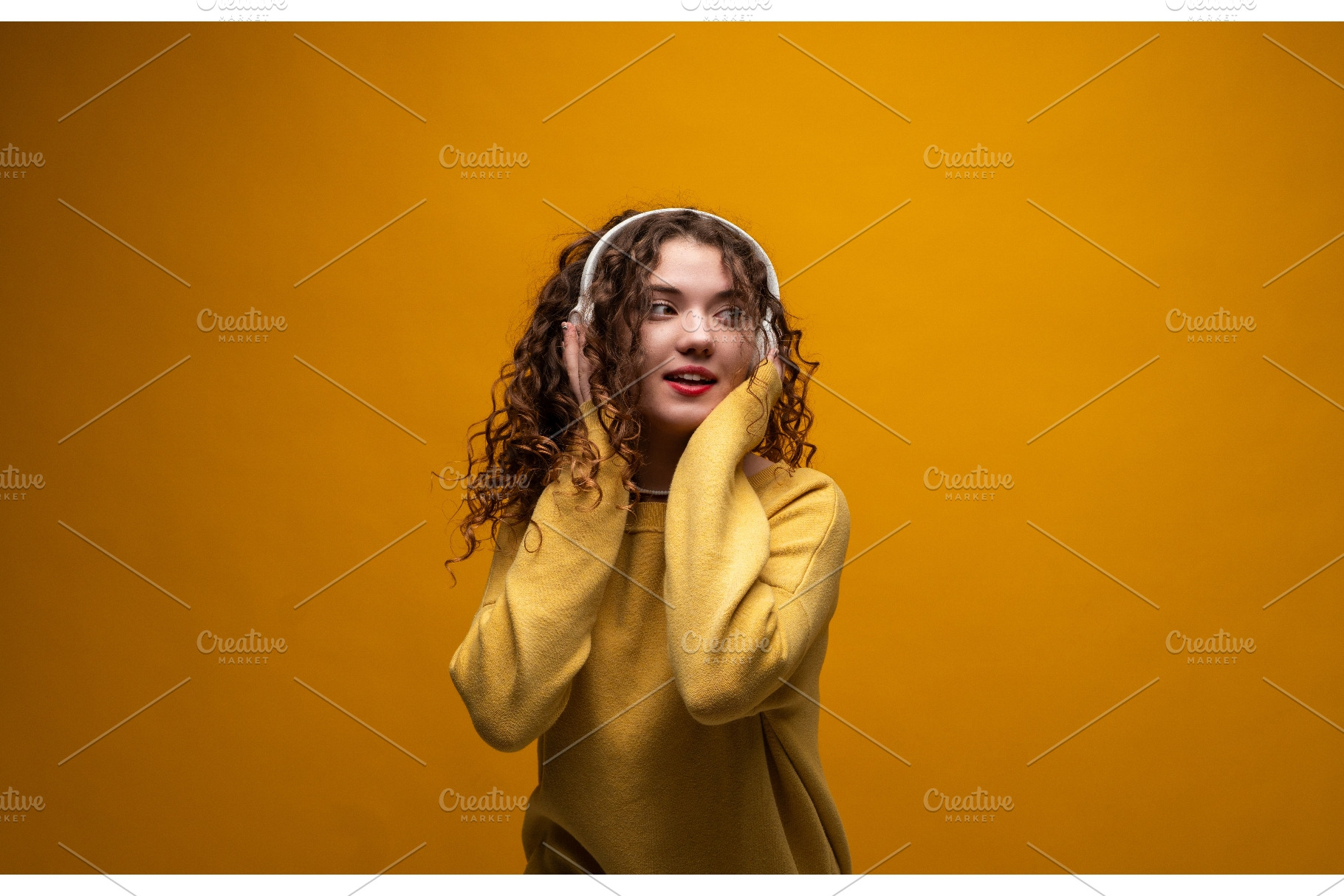 Young woman with curly hair, a Person Photo by volodymyrshtun13795