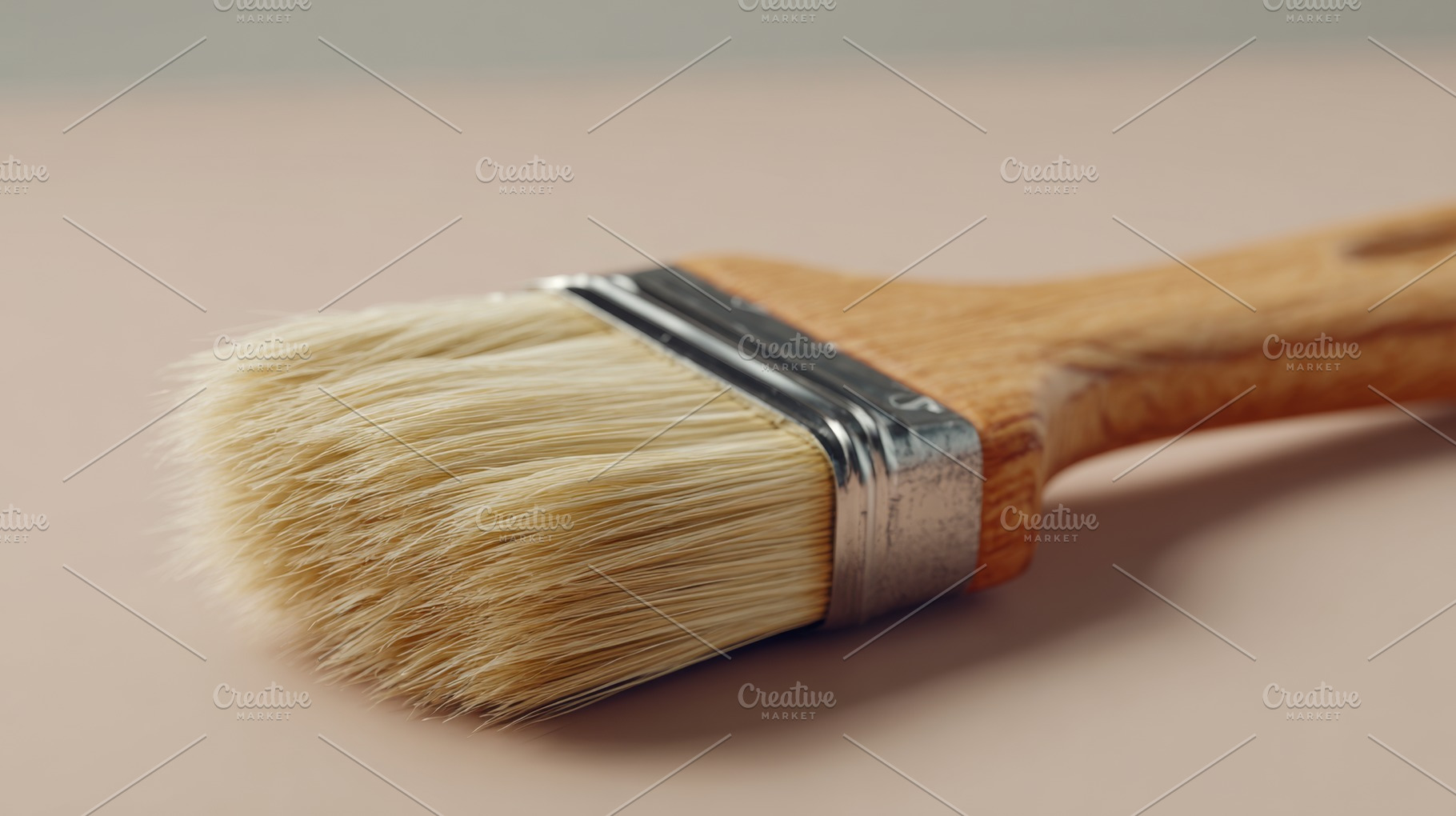 Close-up of a wooden paintbrush with soft bristles, resting on a pale backgroun, a Business Photo by ImageMir