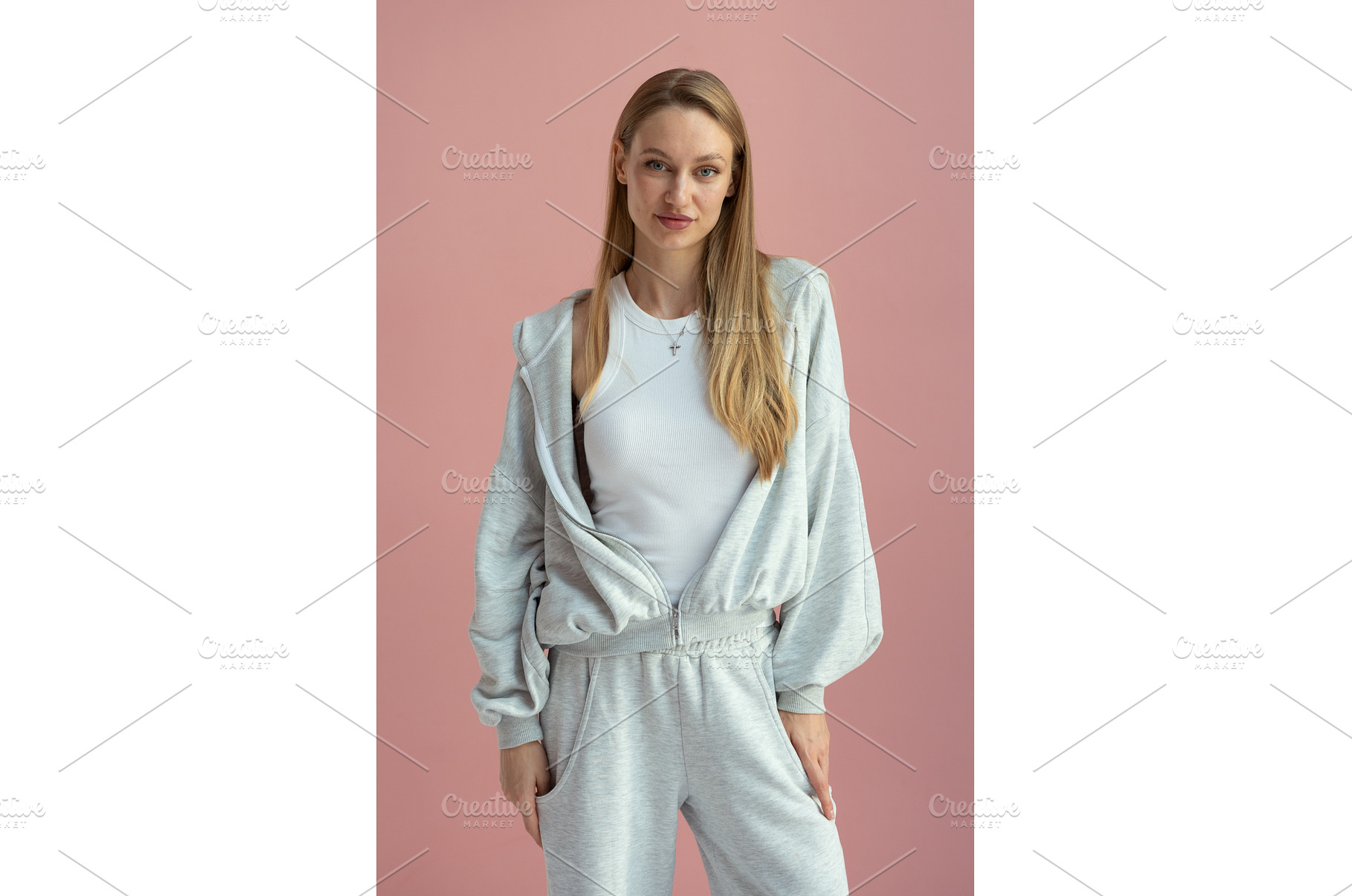 Woman stands against pink background, a Person Photo by undrey