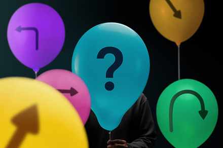 Economic uncertainty symbolized by arrows and a question mark on