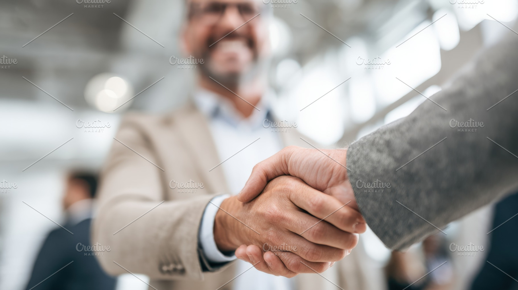 Partners handshake at meeting, a Photo by Beautiful things