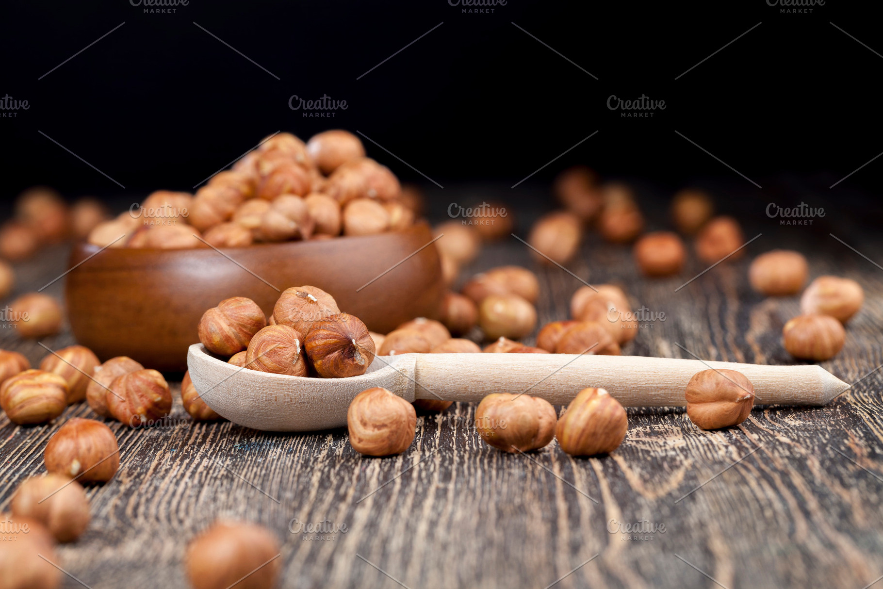 A pile of hazelnuts on the table, a Food & Drink Photo by rsoollAI