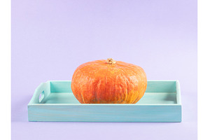 Vibrant orange pumpkin on purple, a Food & Drink Photo by Lifemorning