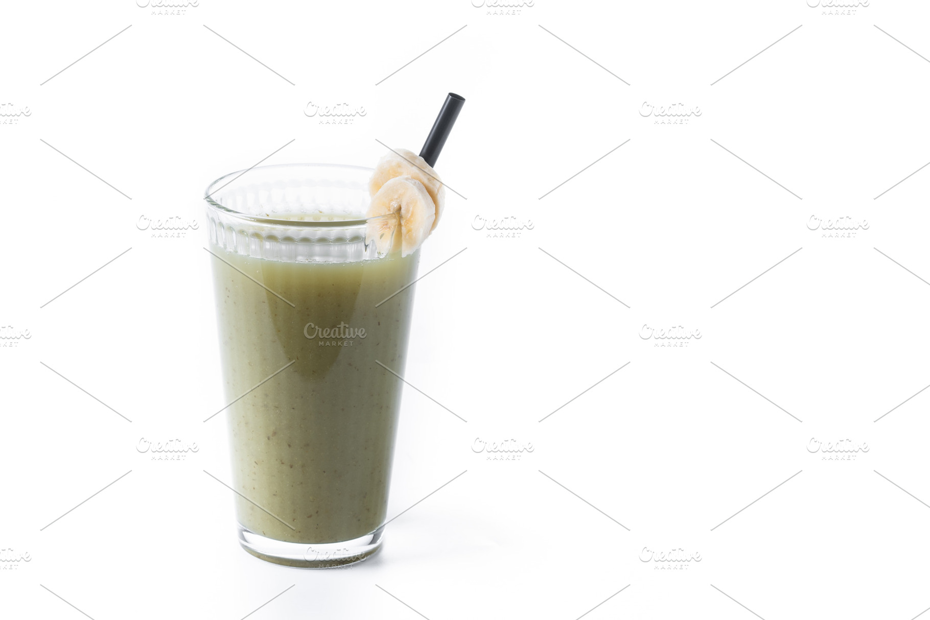 Green smoothie with spinach,banana, apple, and lemon isolated on white backgrou, a Food & Drink Photo by etorres69