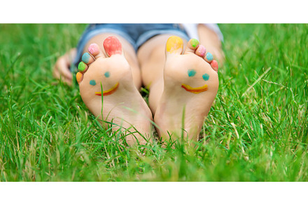 Children's feet with a pattern of, a Nature Photo by yanadjana