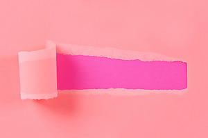 Torn color wrapped paper with space stock photo containing torn and blank
