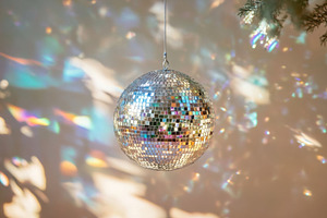 Disco ball shining bright, a Photo by Beautiful things