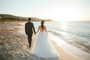 Bride and groom enjoy a peaceful, a Photo by Pavel_design