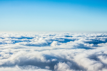 between clouds and sky