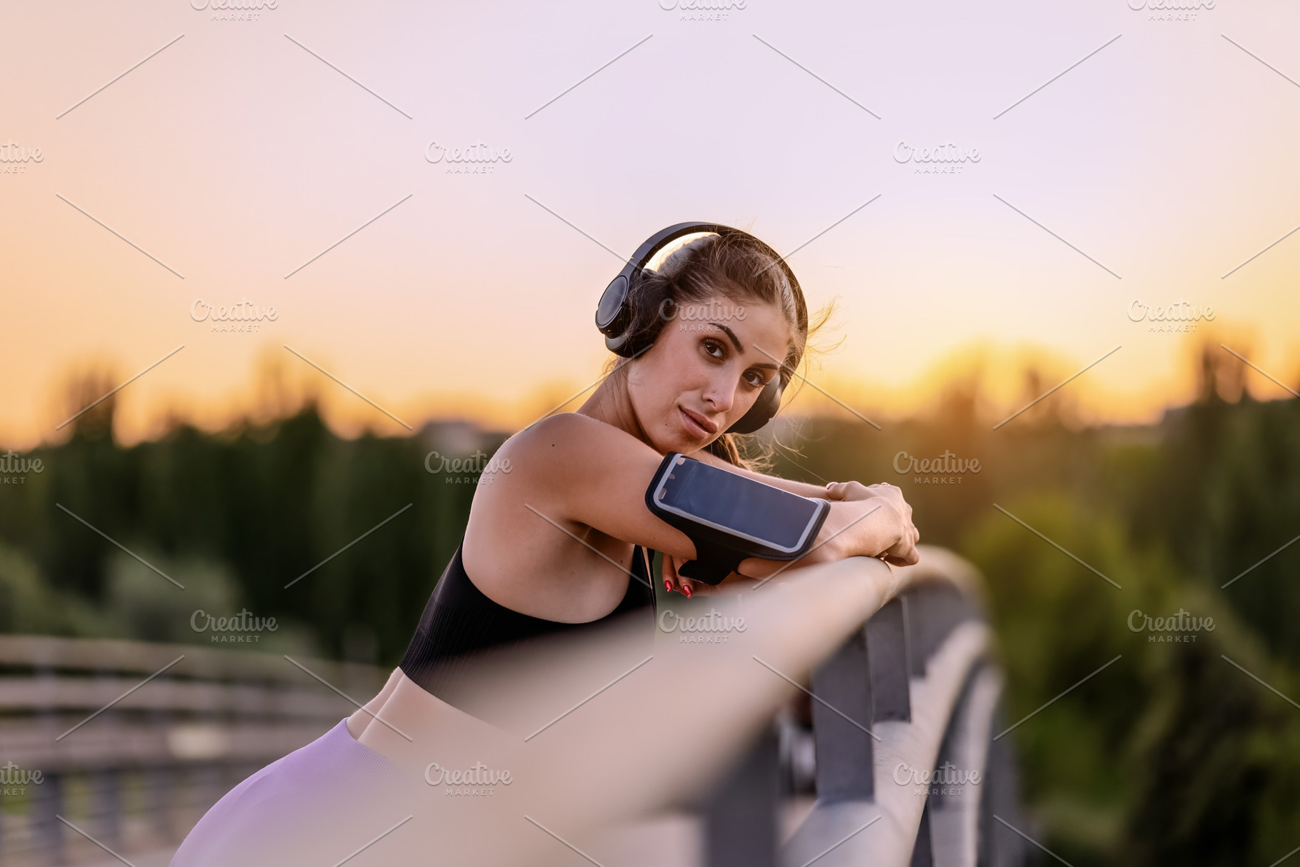 Young woman with headphones resting, a Sports & Recreation Photo by Perpis