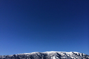 Snow covered mountain stock photo containing winter and snow