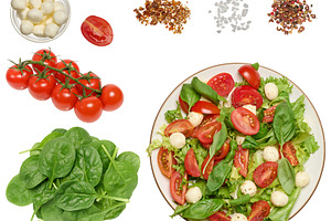 Salad ingredients and finished dish on a plate on an isolated ba, a Food & Drink Photo by ndanko