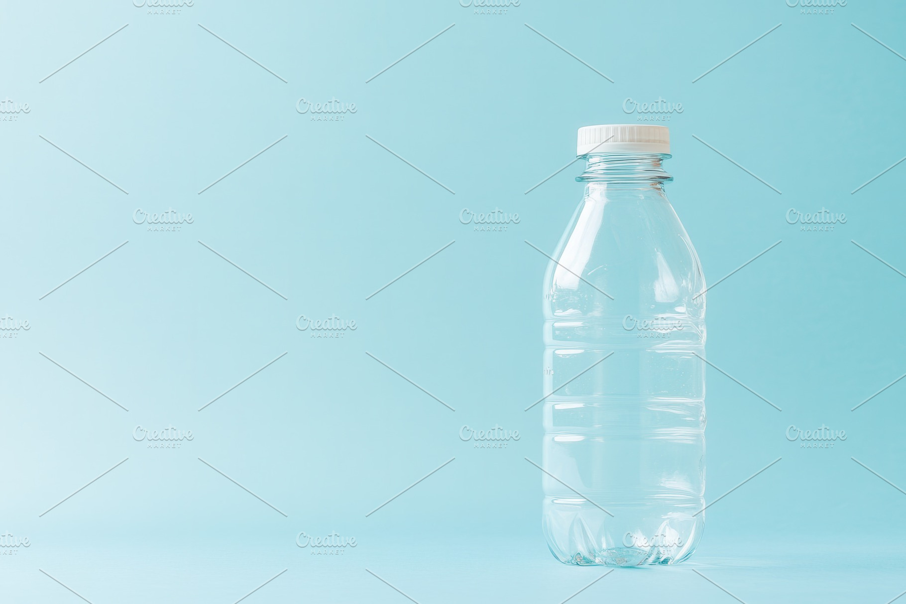 Simple clear plastic water bottle, a Photo by Pavel_design