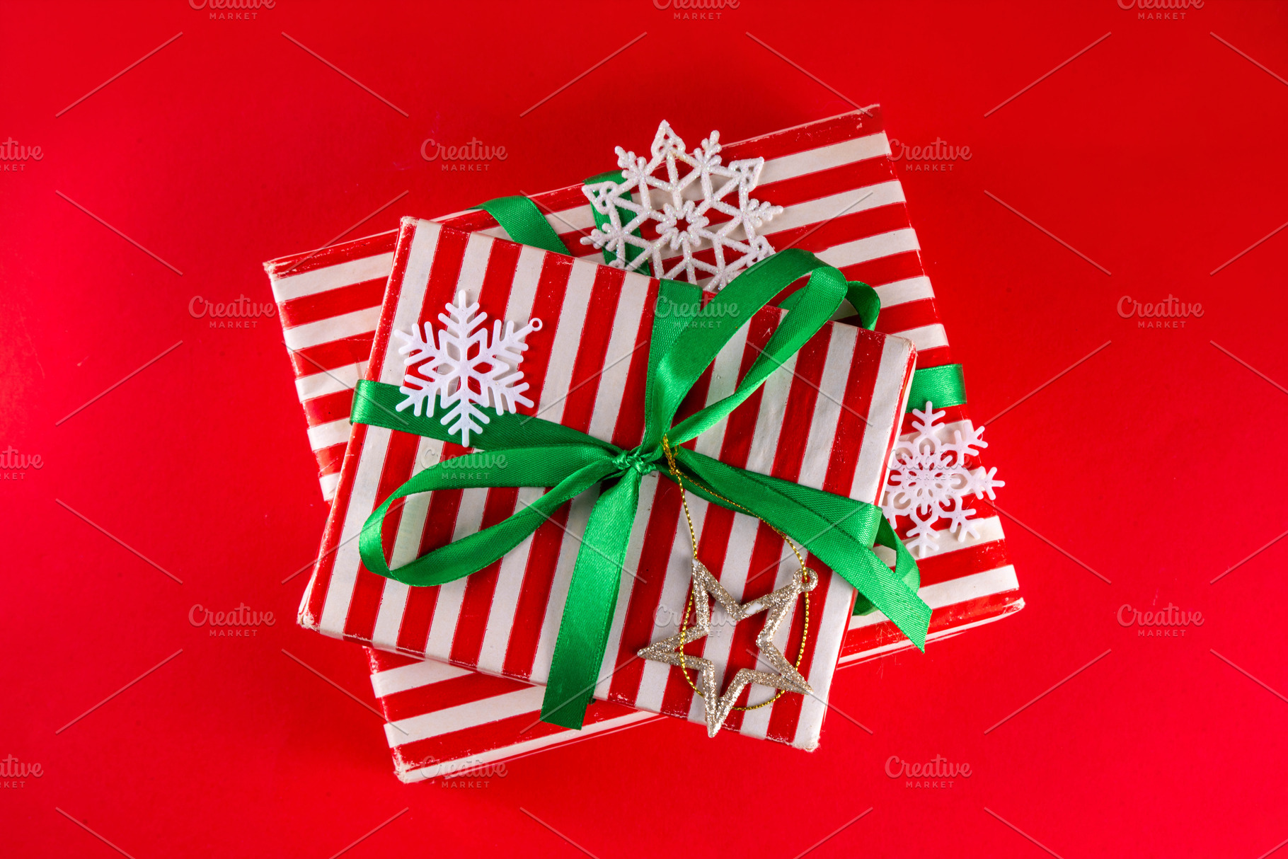 Bright high-colored background with Christmas boxes, festive bau, a Holiday Photo by Rimma