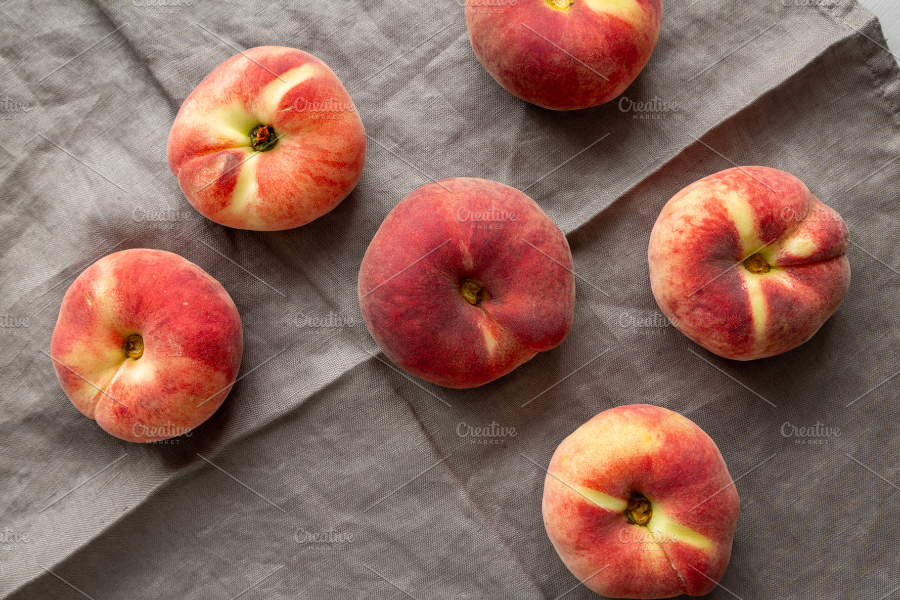 Fresh juicy ripe fig peaches, top view. Overhead, from above., a Food & Drink Photo by LiudmylaChuhunova