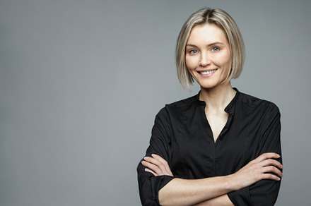 Beautiful middleaged woman on a stock photo containing woman and black