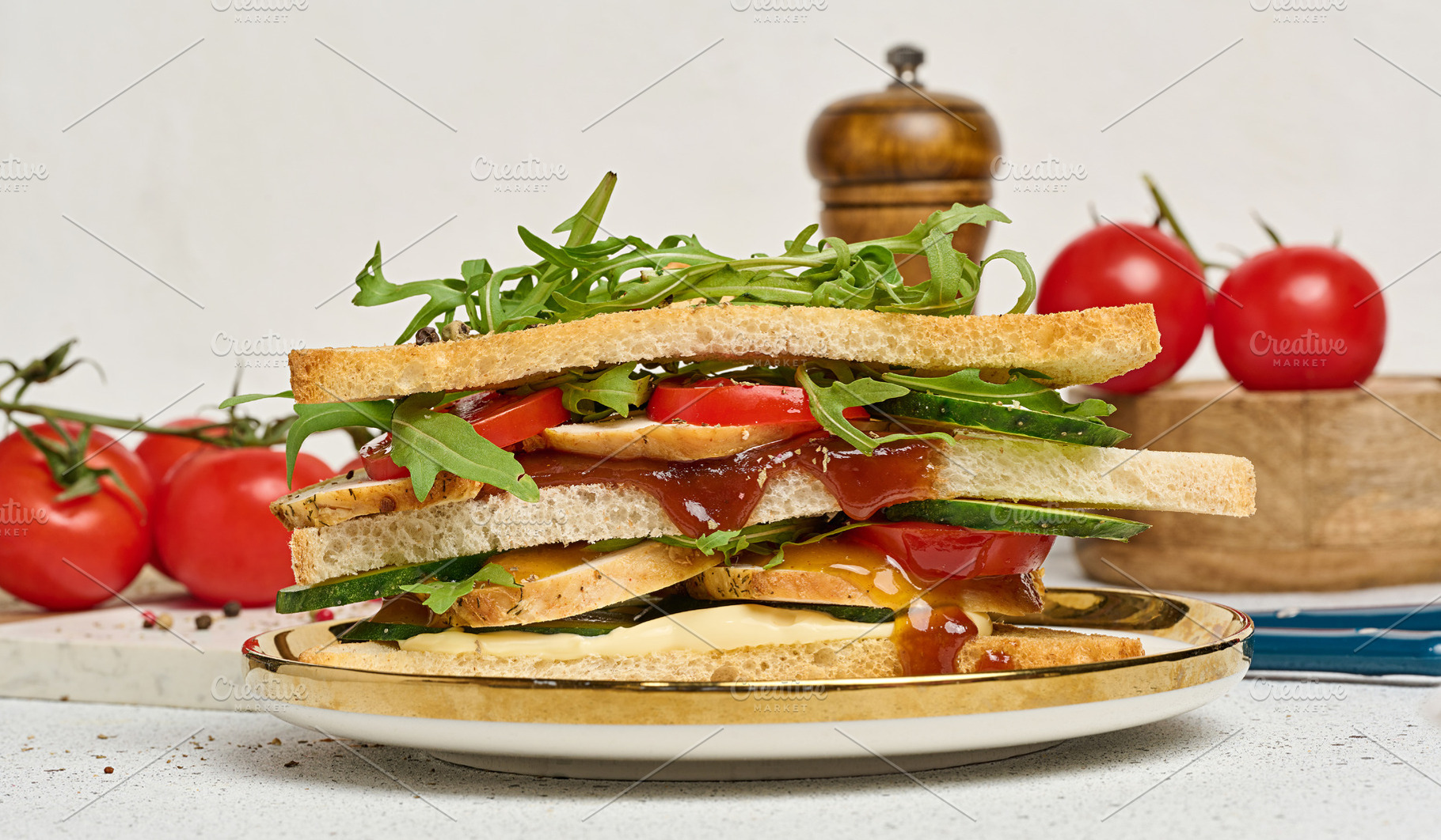 Sandwich with grilled chicken, fresh cucumber, tomato, arugula a, a Food & Drink Photo by ndanko