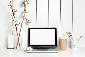 Workplace with cotton & brushes stock photo containing laptop and minimal