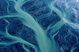 River meets ocean in a coastal area, a Photo by Beautiful things