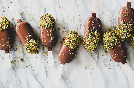 Chocolate glazed ice cream pops with containing ice cream, food, and popsicle, a Food & Drink Photo by Foxys