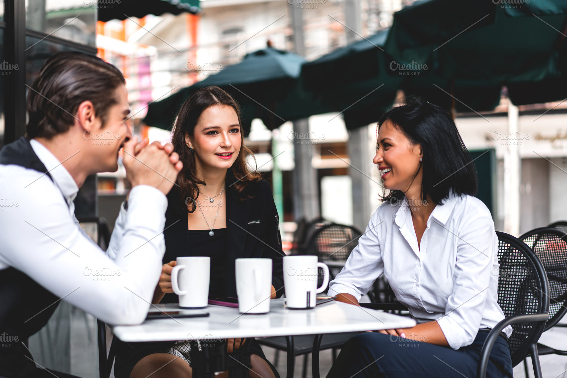 Group of cheerful young friend discussing meeting and talk enjoy, a Person Photo by Art_Photo