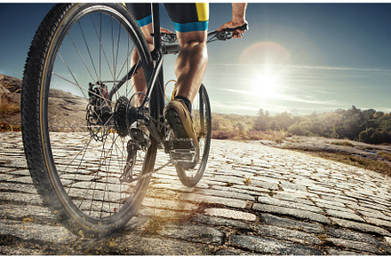 Detail of cyclist man feet riding mountain bike on outdoor trail on country, a Sports & Recreation Photo by Volodymyr Melnyk