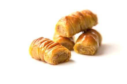 Oriental sweet baklava isolate on a, a Food & Drink Photo by yanadjana