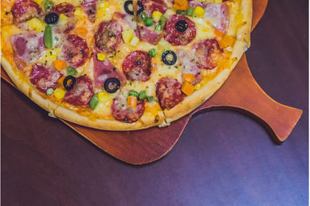 Homemade cheese pizza with salami, a Food & Drink Photo by Elizaveta Galitskaya