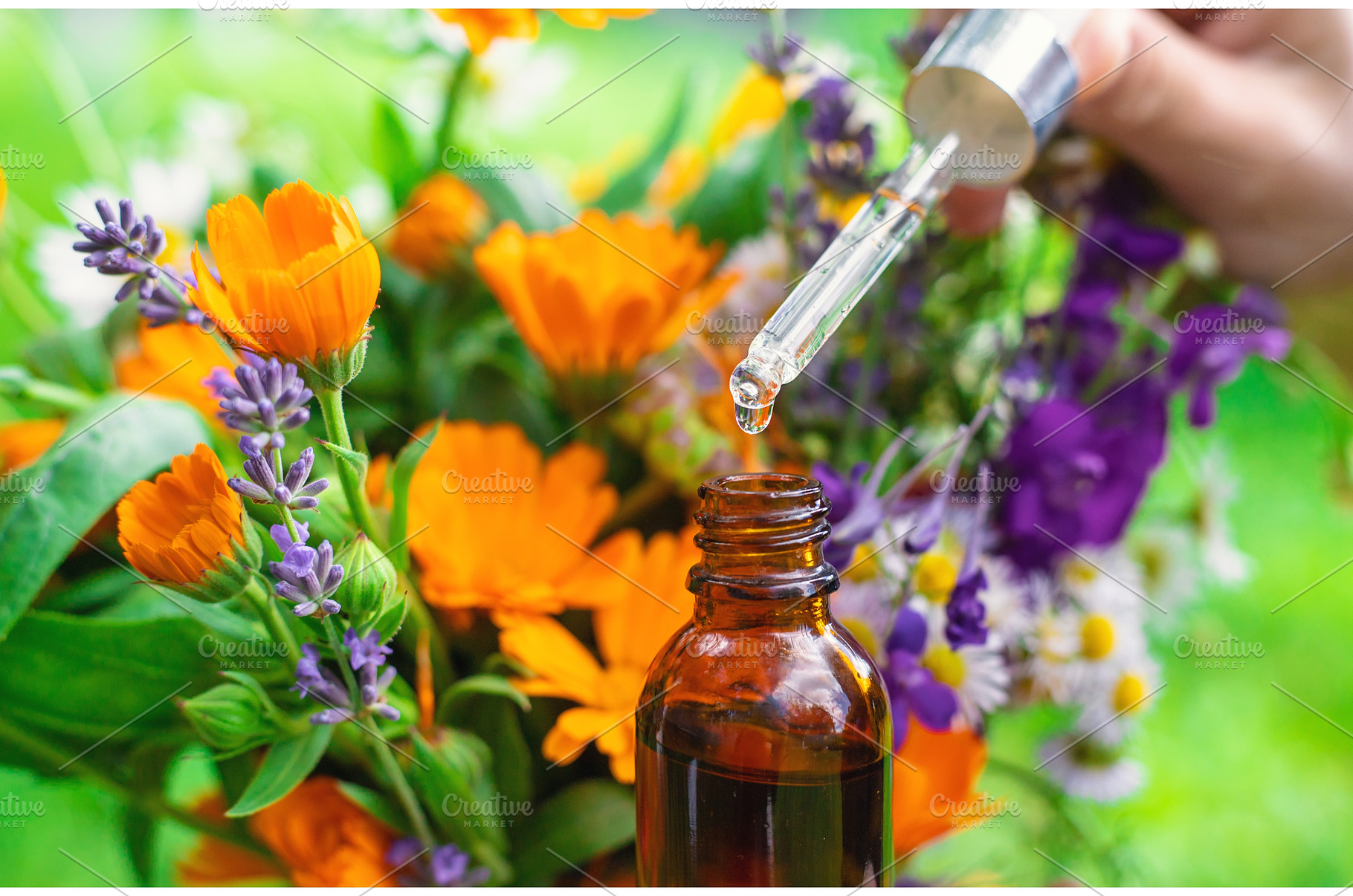 Essential oil of flowers and herbs, a Nature Photo by yanadjana