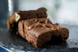 Nut brownie chocolate dessert sweet pastry served, a Food & Drink Photo by Photo Drive Studio