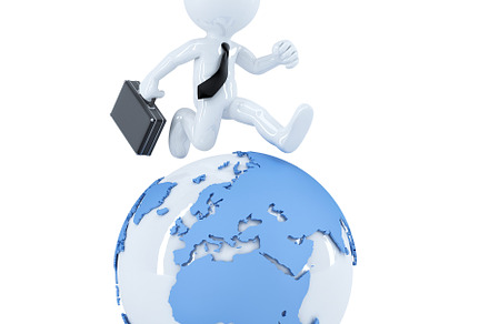 Businessman running around a globe