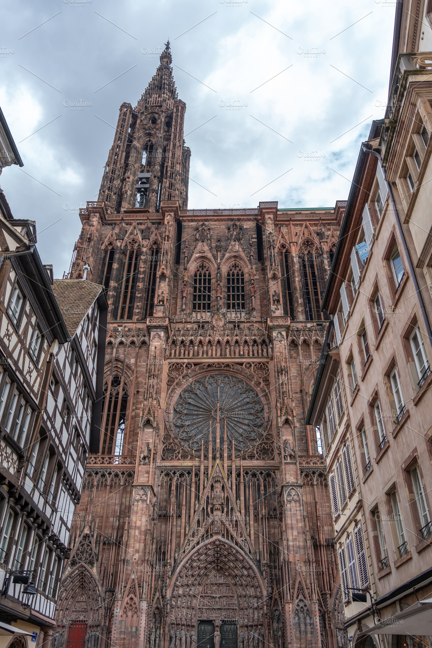 Strasbourg Cathedral viewed from the narrow street, an Architecture Photo by GoodGoods