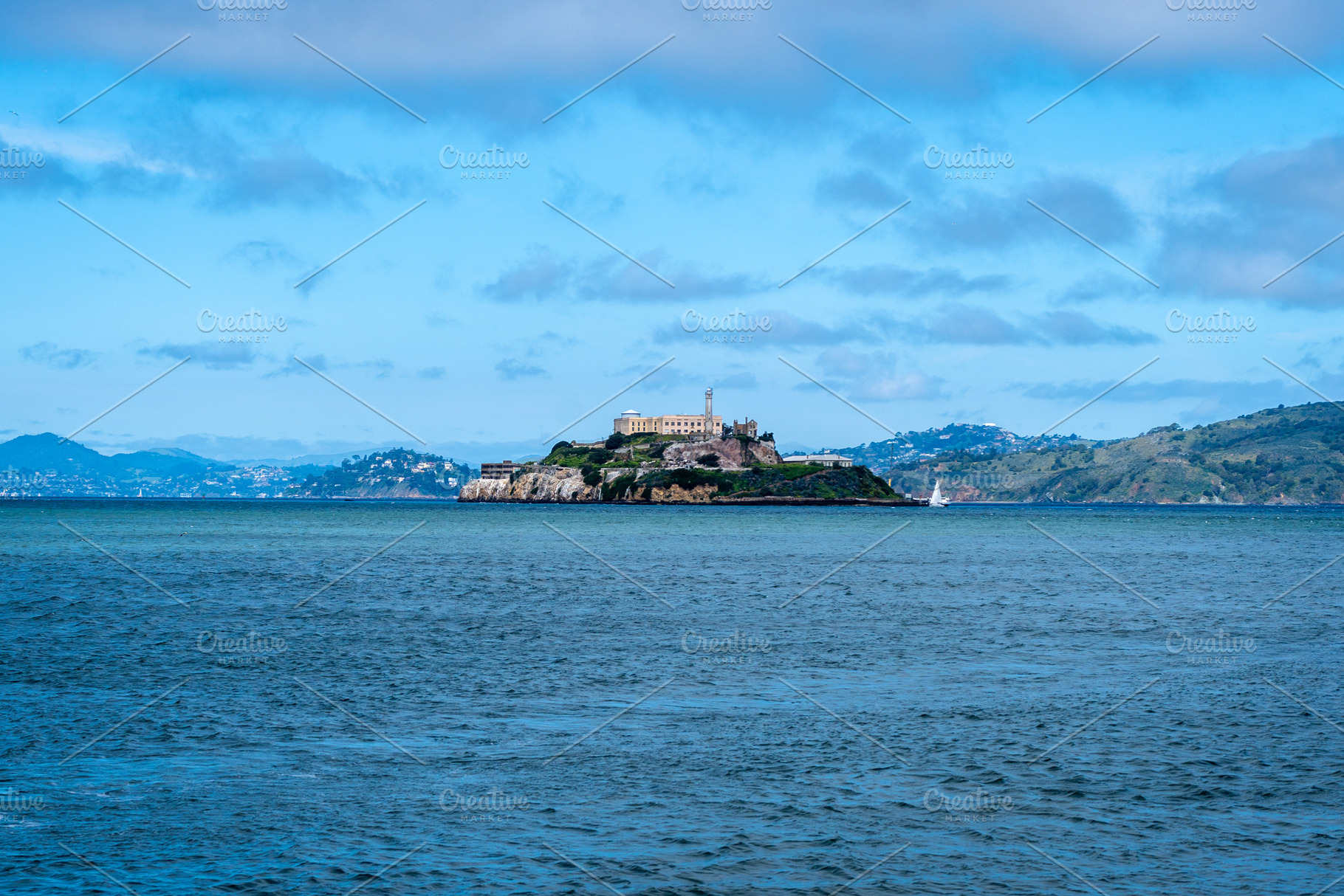 Alcatraz Island surrounded by blue waters in San Francisco Bay,, a Nature Photo by GoodGoods