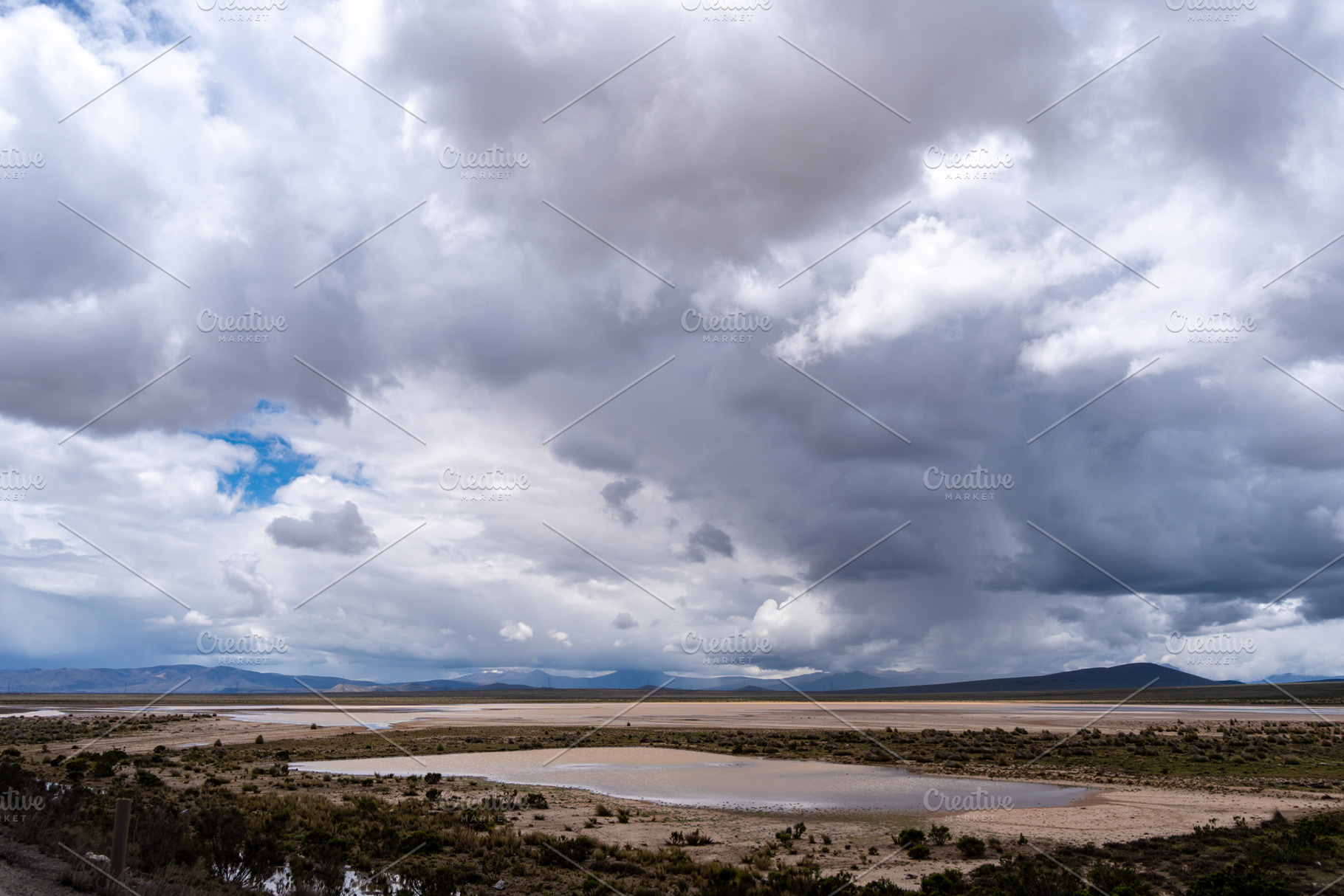 Vast valley and mountains landscape with dramatic sky, Peru, a Photo by GoodGoods