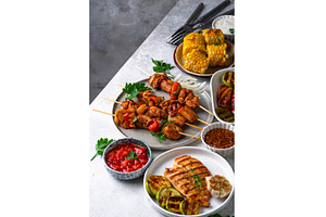 Assortment of grilled bbq meat and, a Food & Drink Photo by Yulia Furman