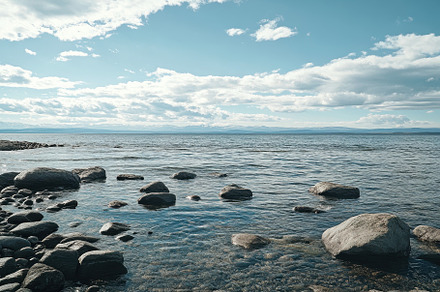 Calm Waters Stretch Beneath a Serene, a Photo by Tanuart